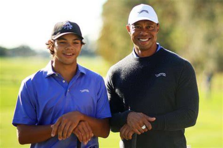 Tiger Woods Gives Son Charlie, 11, Big Hug After Showing Off Twinning