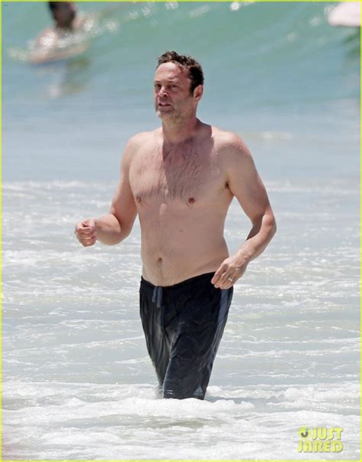 Vince Vaughn goes shirtless at the beach with his wife Kyla and two